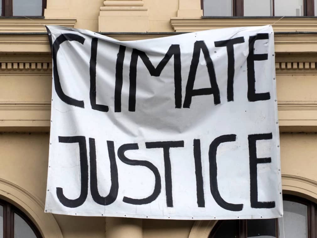 Climate Justice Banner on Building